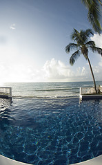 Image showing infinity pool with float caribbean sea