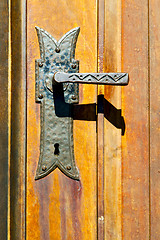 Image showing castellanza blur  brown knocker in a  door c  wood italy   cross