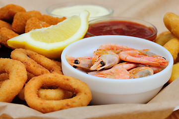 Image showing beer snack, shrimps, calmar rings and fish sticks