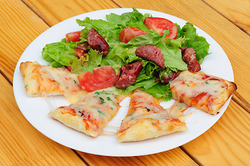 Image showing Pizza slices and salad