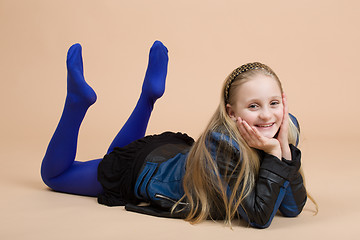 Image showing Fashion smiley european little girl posing