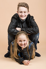 Image showing Fashion smiley european siblings posing