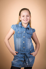 Image showing Fashion smiley european little girl posing