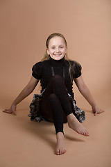 Image showing Fashion smiley european little girl posing