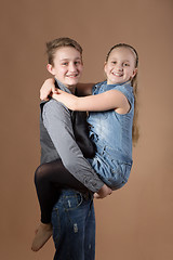 Image showing Fashion smiley european siblings posing