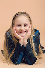 Image showing Fashion smiley european little girl posing