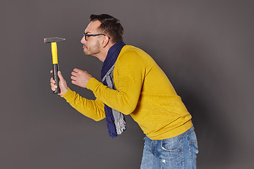 Image showing Man with hammer