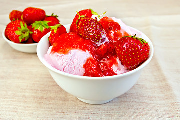 Image showing Ice cream strawberry in bowl on fabric