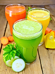 Image showing Juice cucumber and vegetable in three glassful on board