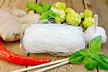 Image showing Noodles rice thin with vegetables and spices on board