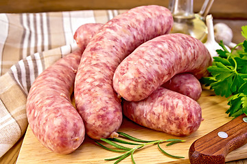 Image showing Sausages pork on board with knife