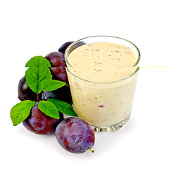 Image showing Milkshake with plums and leaves