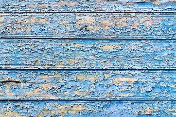 Image showing Old board with peeling blue paint