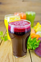 Image showing Juice beetroot and vegetable with parsley on board