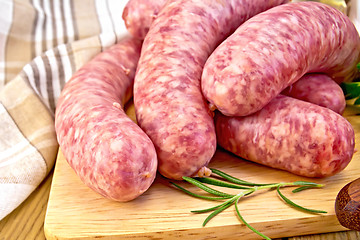 Image showing Sausages pork on board with napkin