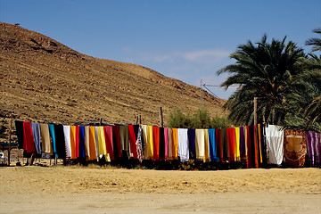 Image showing market and clothes in the desert