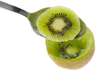 Image showing Spoon scooping kiwifruit

