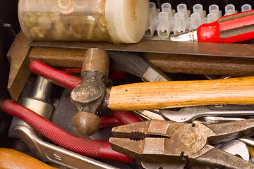 Image showing Tools in a messy toolbox

