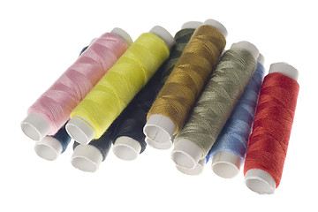 Image showing Rows of colorful sewing threads

