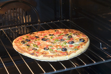 Image showing Vegetarian pizza in oven

