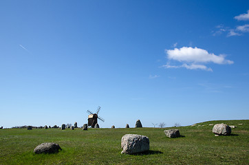 Image showing Old windmill and old graveyard