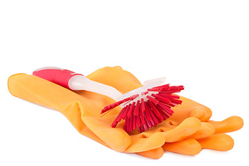 Image showing Red dish washing brush with rubber gloves