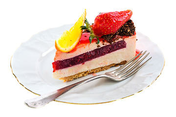 Image showing Piece of cake with a fresh strawberry and orange.