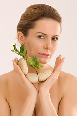 Image showing Woman while relaxing with aromatherapy