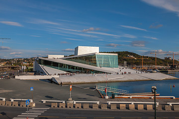 Image showing OSLO, NORWAY - May 4, 2011: People walking on the roof of the Oslo Opera House. The Oslo Opera House is home The Norwegian National Opera and Ballet, and the National Opera Theatre.