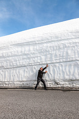 Image showing highway along the snow wall. Norway in spring