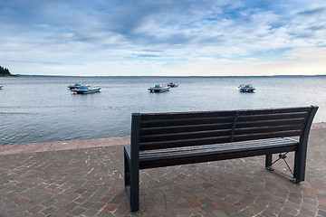 Image showing Wood bench at the Garda lake