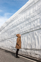 Image showing highway along the snow wall. Norway in spring