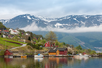 Image showing Landscape with mountains.  village in Norwegian fjords