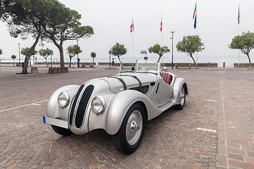 Image showing SIRMIONE, Province of Brescia,  ITALY - MAY 08 unidentified crew on an old car BMW 328 coupe 1938 in italian historical rally Mille Miglia 2014, on May 08, 2014 in  Lake Garda town of Sirmione, Italy