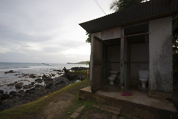 Image showing OUTHOUSE TOILETS BY SEA