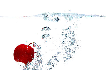 Image showing Apple falls deeply under water 