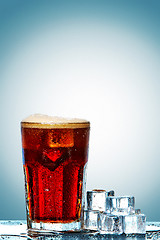 Image showing Glass of cola with ice cubes