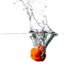 Image showing Pepper drops into a water 