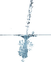 Image showing Water making bubbles upon being poured into more water.