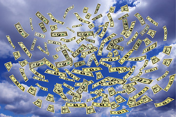 Image showing dollars flying away to the sky