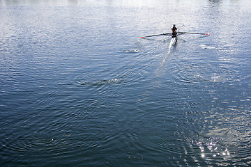 Image showing Women rowing in a lake