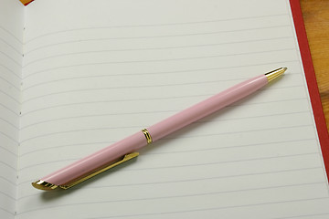 Image showing pen on a notebook