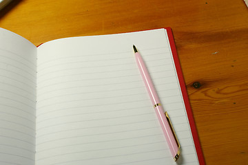 Image showing pen on a notebook