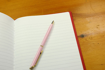 Image showing pen on a notebook