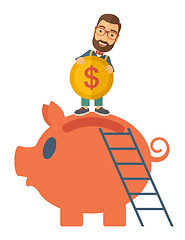 Image showing Big piggy bank with ladder