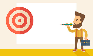 Image showing Working man holding a target arrow 