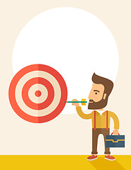Image showing Working man holding a target arrow 