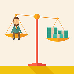 Image showing Businessman on a balance scale