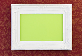 Image showing White Frame on dark red 