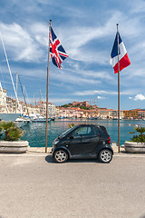 Image showing small car on the waterfront of Porto Azzurro, Italy